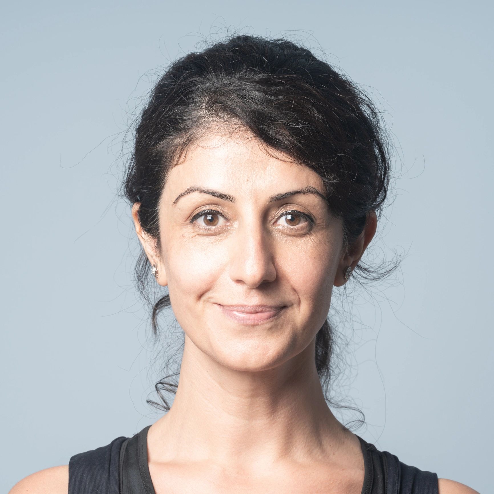 Portrait of a salon stylist smiling