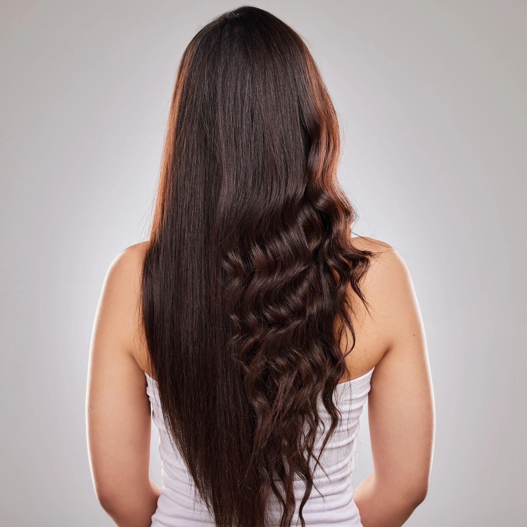 Styled hair with straight and curled finish